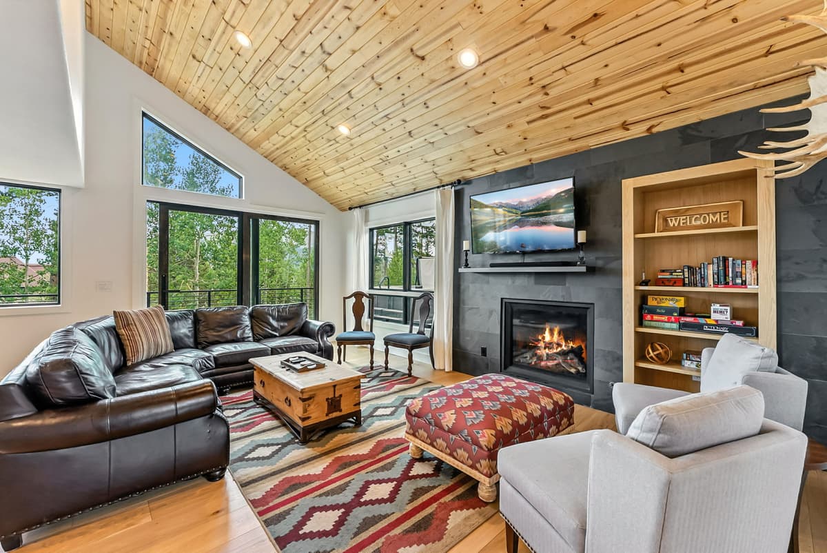 Four O'Clock Retreat luxury living room with vaulted ceilings